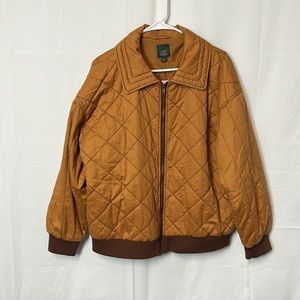 Wild fable, woman’s quilted jacket. Color desert orange.